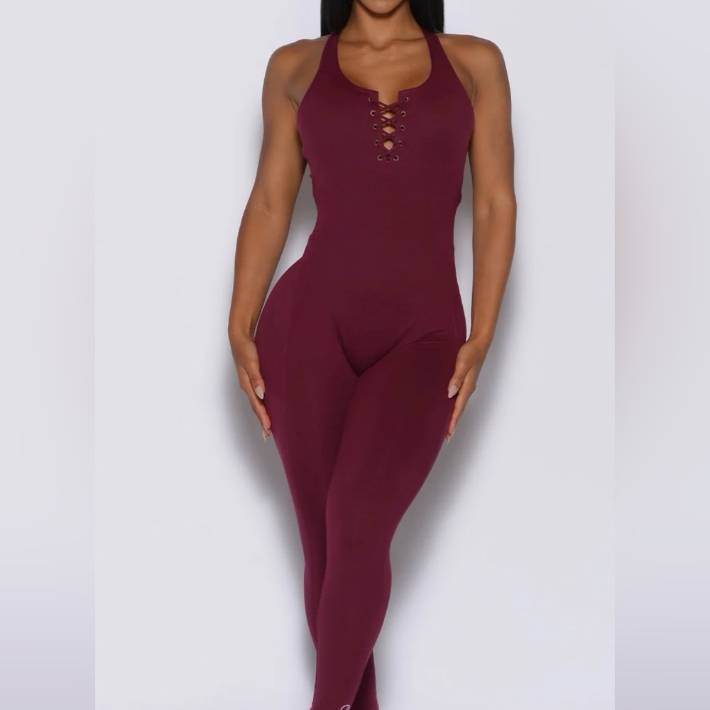 Bombshell Sportswear Laced Bodysuit in burgundy